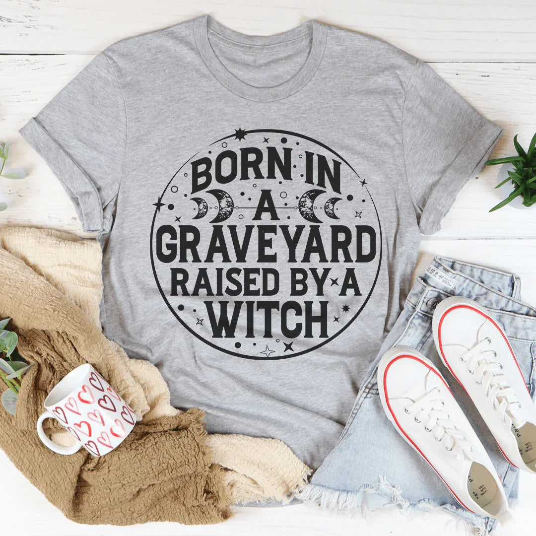 Born In A Graveyard Raised By A Witch Tee