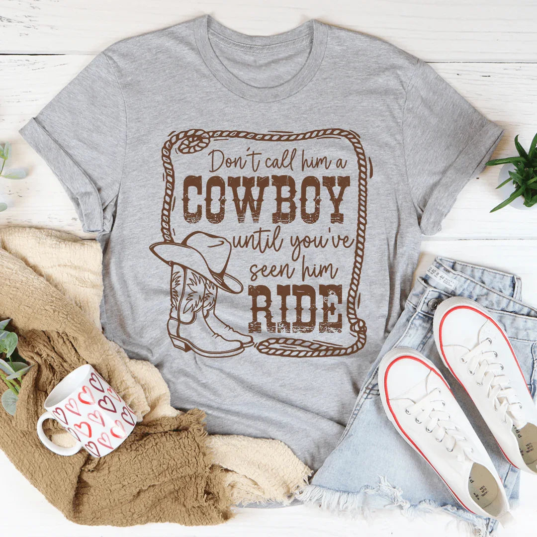 Don't Call Him A Cowboy Until You've Seen Him Ride Tee