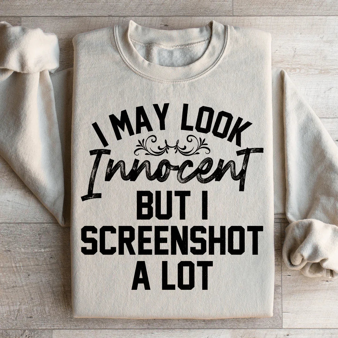 I May Look Innocent But I Screenshot A Lot Sweatshirt