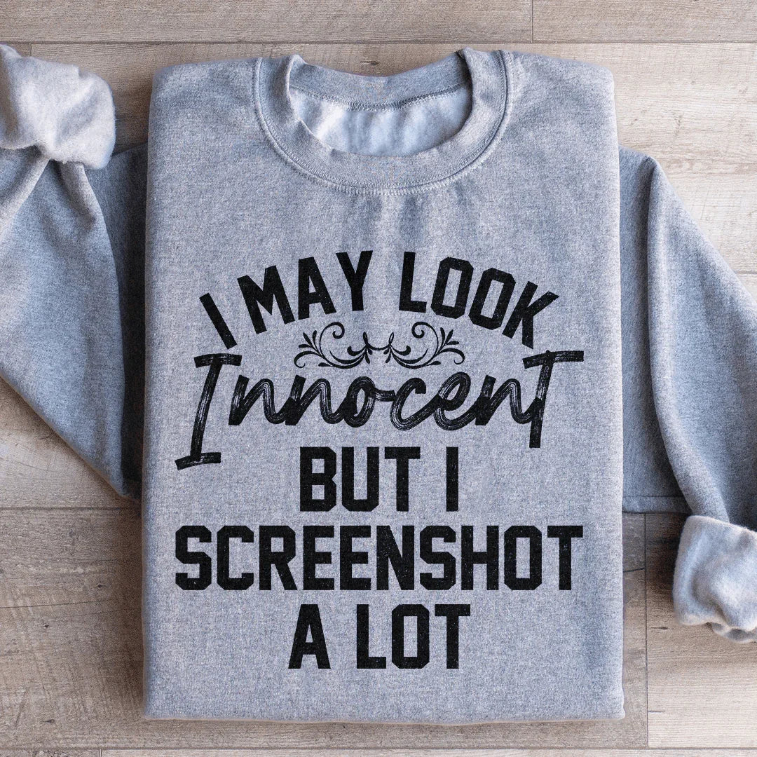 I May Look Innocent But I Screenshot A Lot Sweatshirt