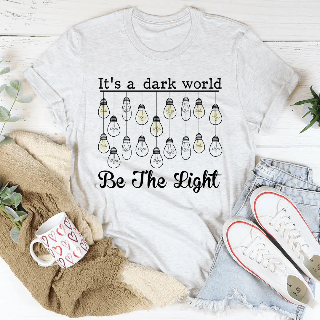 It's A Dark World Be The Light Tee