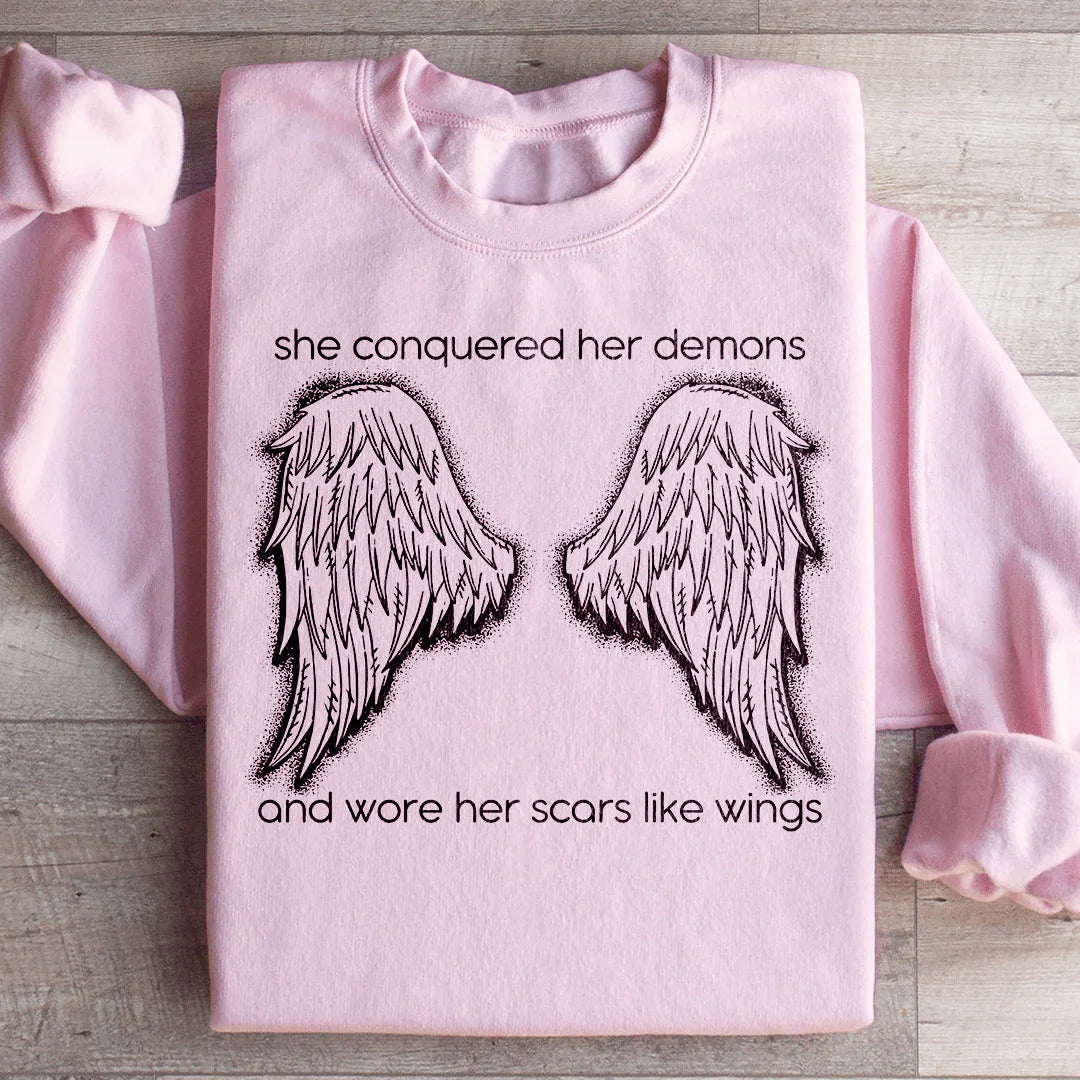 She Conquered Her Demons And Wore Her Scars Like Wings Sweatshirt