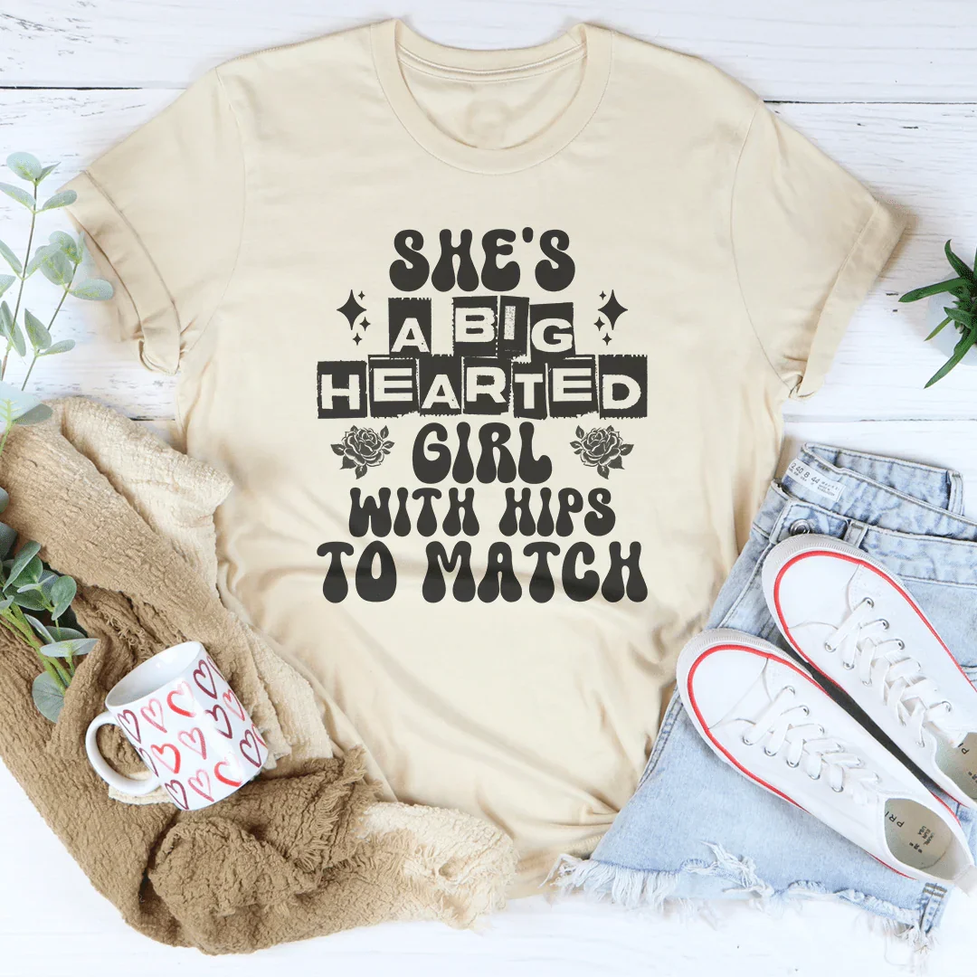 She's a big hearted girl with hips to match Tee